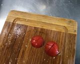 Une image de l'étape 7 de Salade de coeurs d'artichauts aux tomates, concombre et fleurs de thym.