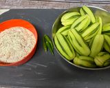 A picture of step 1 of Shahi parval (pointed gourd curry).