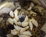 A picture of step 2 of Squid Ghee Roast.
