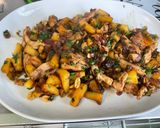 Une image de l'étape 15 de Poulet à l’ananas, oignon rouge, coriandre et cacahuètes.