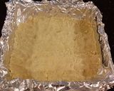 A picture of step 4 of Fresh Berrie Crumble Bars with White and Milk Chocolate Glaze.