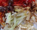 A picture of step 2 of Tom Sum/Thai Raw Papaya Salad.