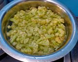 A picture of step 1 of Cauliflower peas and potato sabzi.