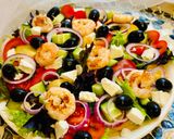 A picture of step 6 of Greek salad with shrimps.