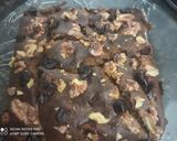 A picture of step 10 of Eggless Date and Walnut Cake.