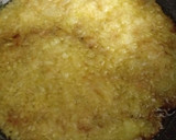 Foto del paso 4 de la receta: Calabacín relleno de zanahorias y nueces con arroz salteado con pasas y caqui