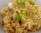 A picture of step 4 of My Egg fried Rice with the malaysian curry sauce.