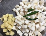 A picture of step 1 of Shola Kochur Dalna / Taro Root Curry.