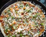 A picture of step 3 of Cone Pizza Dosa.