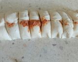 A picture of step 2 of Sun dried tomato pizza spirals.