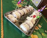 Une image de l'étape 6 de Roulés apéritif au jambon, mozzarella, basilic et épices façon wraps.