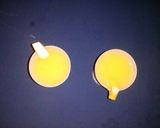 A picture of step 6 of Orange pineapple juice.