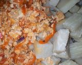 A picture of step 4 of Yam with egg sauce.