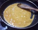 A picture of step 3 of Till & coconut gud patti (chikki).