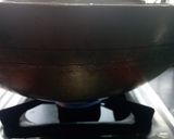 A picture of step 3 of Bhapa Parshe/ steamed parshe fish in mustard gravy.