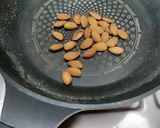 A picture of step 2 of Oats and Ground nut Laddu.
