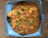A picture of step 8 of Malvani chicken.