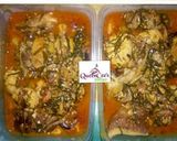 A picture of step 12 of Ofe okazi with achara and egusi balls.