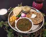 A picture of step 5 of Green Amaranth Curry.