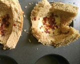 A picture of step 5 of Eggs In Baked Basket.