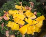A picture of step 4 of Smoked haddock, kale and butterbean baked eggs.