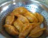 A picture of step 19 of Tomato egg momo.