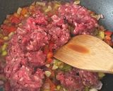 Foto del paso 5 de la receta: Zapallitos rellenos de carne y arroz