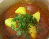 A picture of step 7 of Tin Fish Curry.