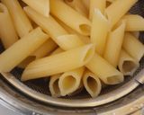 A picture of step 2 of Cheesy Penne In Red Sauce.