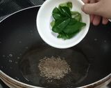A picture of step 5 of Green Masala Chicken Curry.
