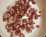 A picture of step 2 of Pennette with Pancetta, Yellow Cherry Tomato Sauce, and Pecorino (Fake Carbonara).