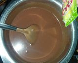 A picture of step 5 of Biscuit cake in a pan.