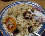 A picture of step 6 of Leftover Aloo gosht sy rice banain.