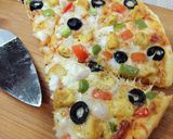 A picture of step 7 of Chicken Tikka Pizza 🍕🍕.