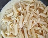 A picture of step 6 of White Sauce Pasta.