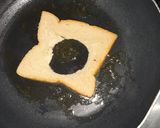 A picture of step 4 of Egg in a nest sandwich.