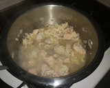 Foto del paso 4 de la receta: Arroz con salmón y marisco