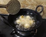 A picture of step 5 of Fried Modak.