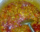 A picture of step 4 of Palm oil jollof rice and beans.