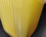 A picture of step 3 of Mix yellow drink.