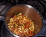 A picture of step 1 of Mixed veg Daliya.