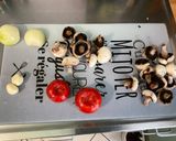 Une image de l'étape 5 de Œufs au four, tomates, champignons et feta.