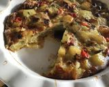 Foto del paso 3 de la receta: Tortilla de papas al horno rellena de jamón y queso