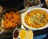 Foto del paso 4 de la receta: Papitas y nuggets sin grasa, un antojito de Domingo
