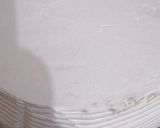 A picture of step 11 of Father's day cream cake.