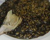 Foto del paso 7 de la receta: Arroz meloso de chipirones con alcachofas confitadas