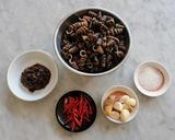 A picture of step 1 of Sauté Snail Shell In Tauchu Sauce.