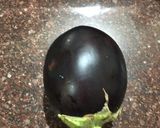 A picture of step 1 of Brinjal bharta.
