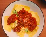 A picture of step 7 of Cheats Pea and Ricotta Ravioli with Rich Tomato Sauce.