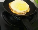 Foto langkah ke 5 dari resep Roti Panggang Telur Keju.